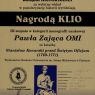 Tabliczka pamiątkowa z informacją o przyznaniu nagrody o. prof. Pawłowi Zającowi OMI